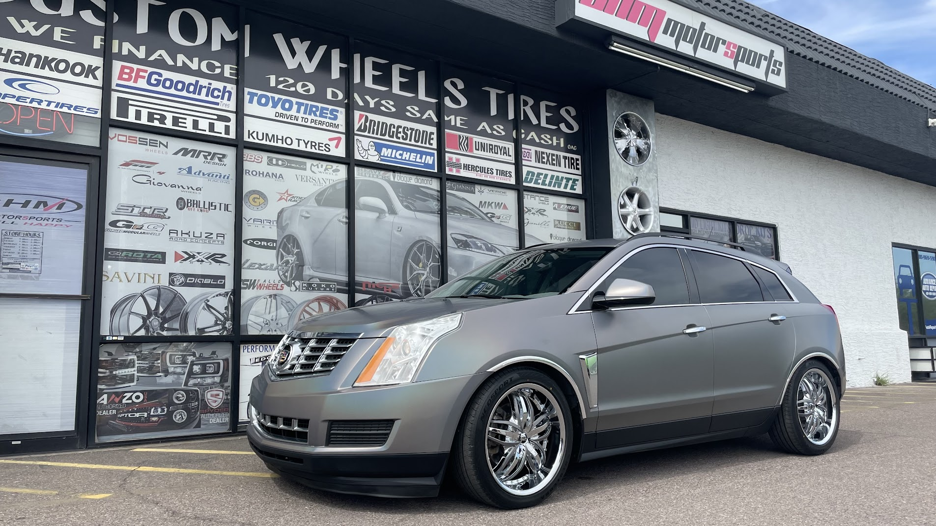 Cadillac SRX with full chameleon wrap, air-ride suspension and 20x8.5 Diablo Angel chrome wheels