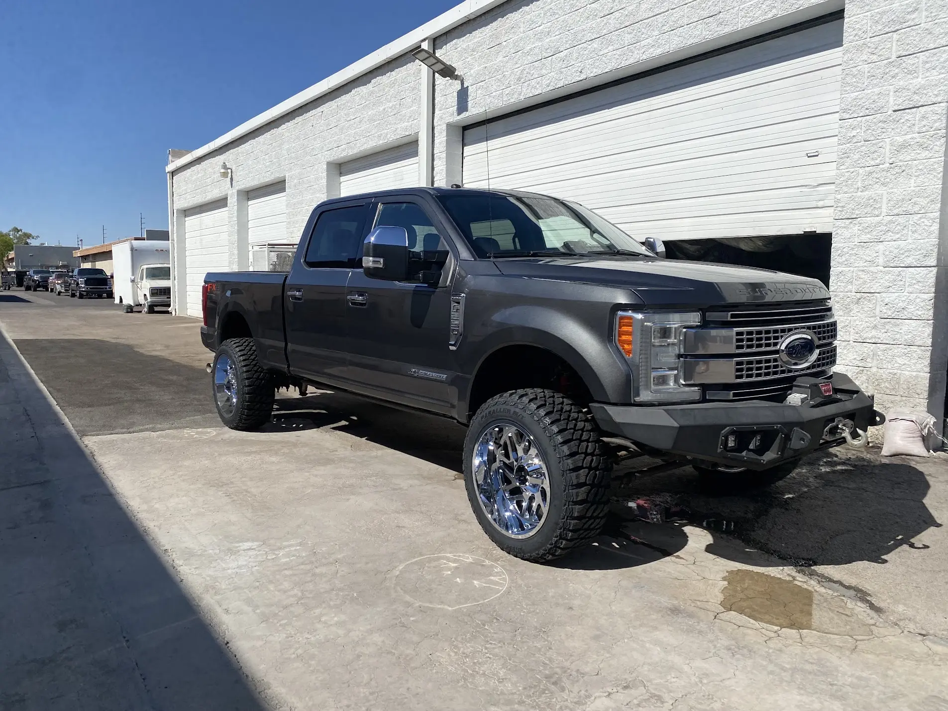 2017 Ford F-250 4x4 with a 6-inch Rough Country lift kit, 24x12 wheels and 35x12.50R24 tires