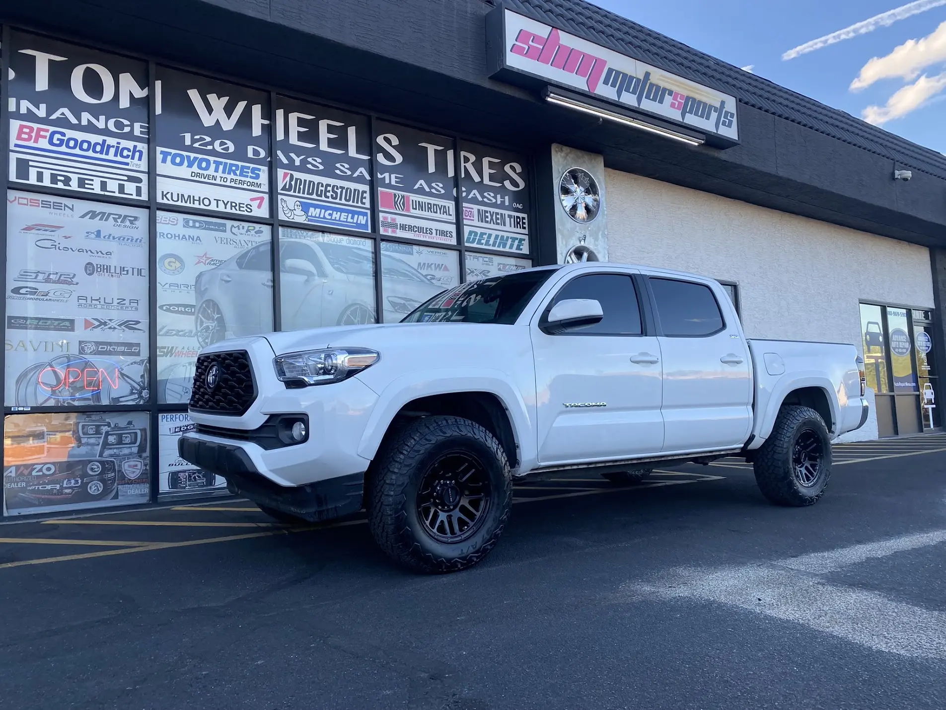 2023 Toyota Tacoma 4x4 on 20x8.5 Xtreme Murdder matte-black wheels with 285/50R20 all-terrain tires