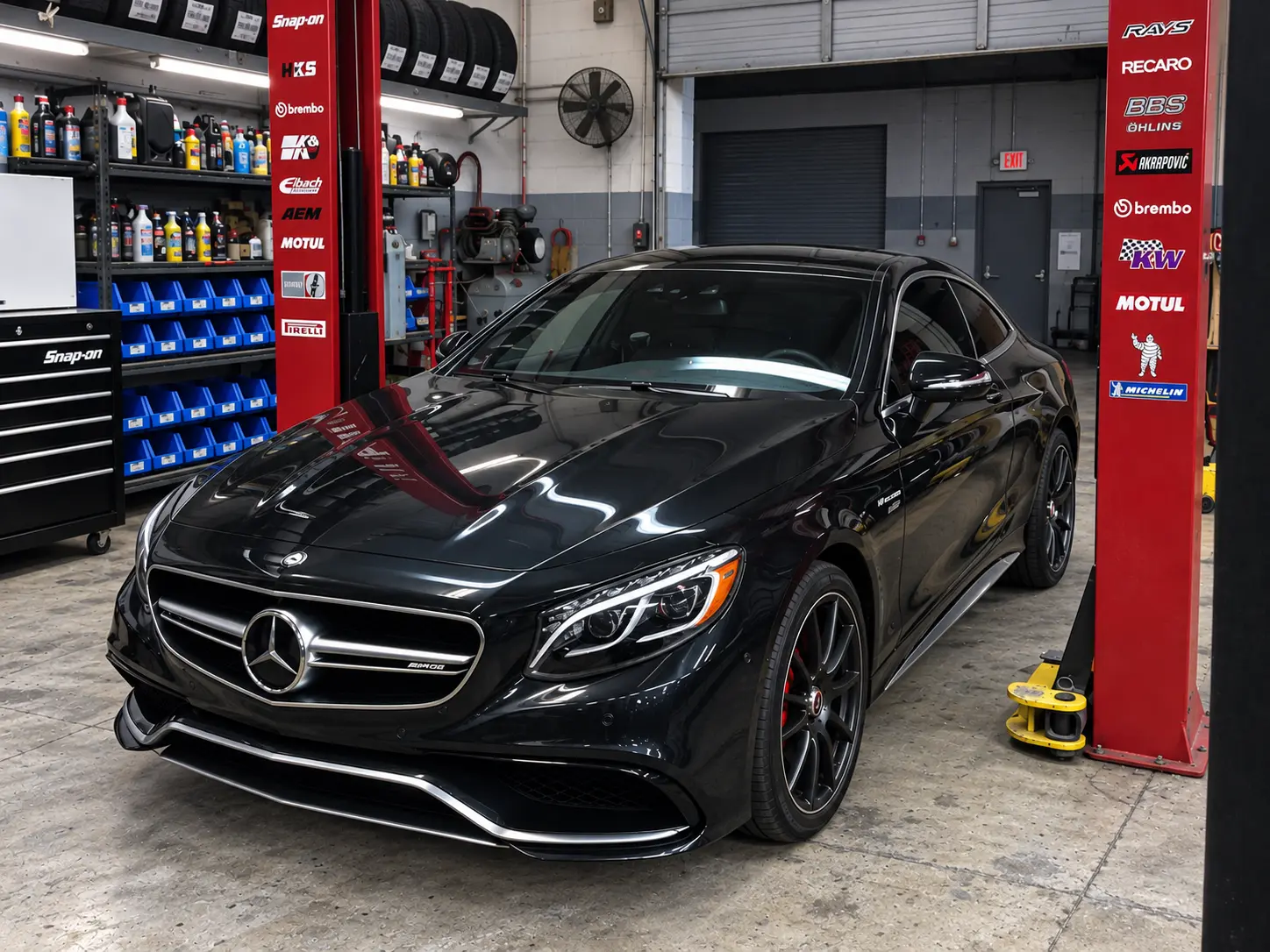 2016 Mercedes-AMG S63 Coupe in black after a lowering kit and 5% ceramic window tint