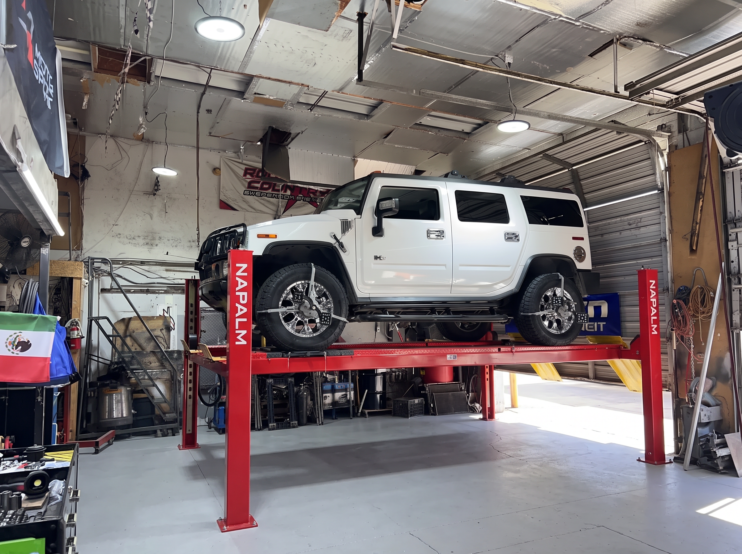 Hummer H2 on the alignment rack at SHM Motorsports