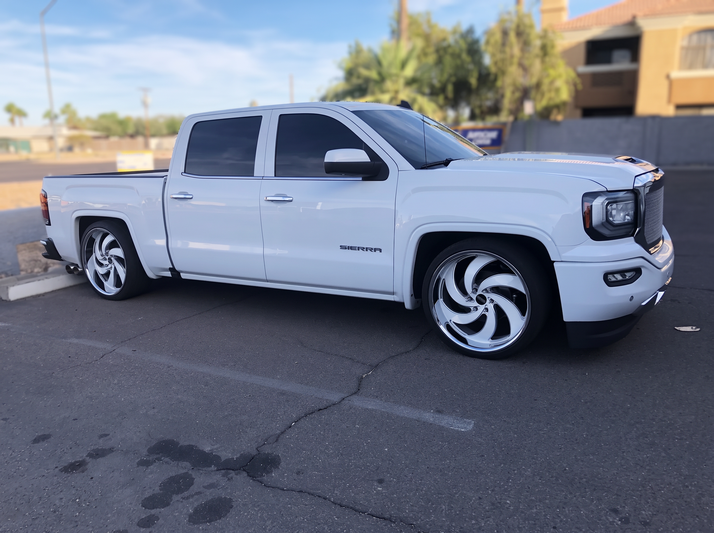 White GMC Sierra on 24x10 Strada Retro-6 wheels with 305/35R24 tires
