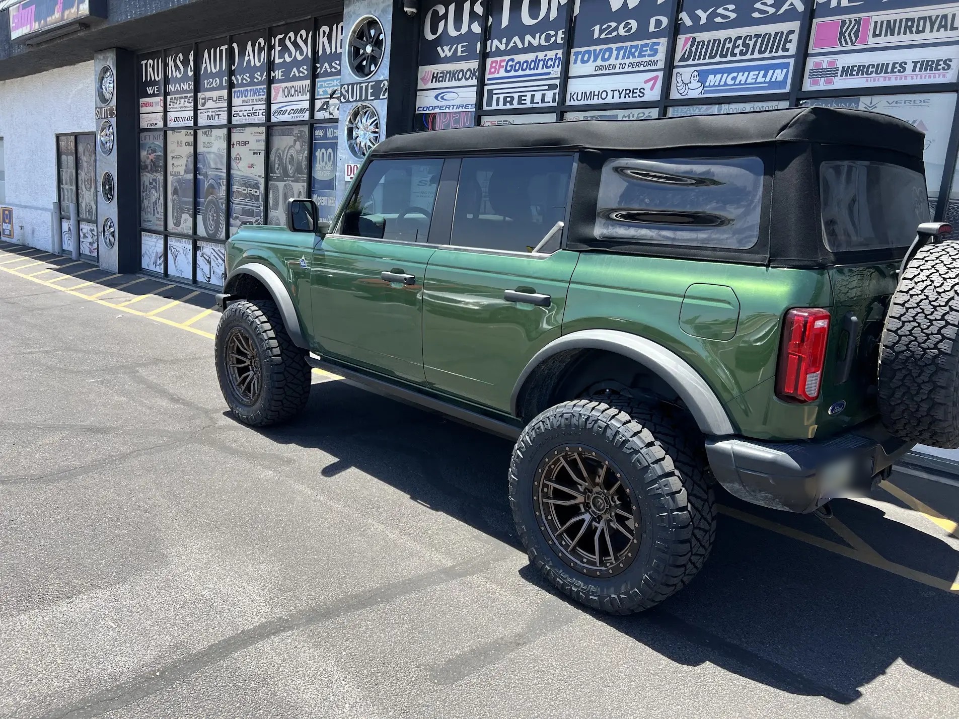 Ford Bronco on 20-inch custom wheels with 33x12.5 MT off-road tires