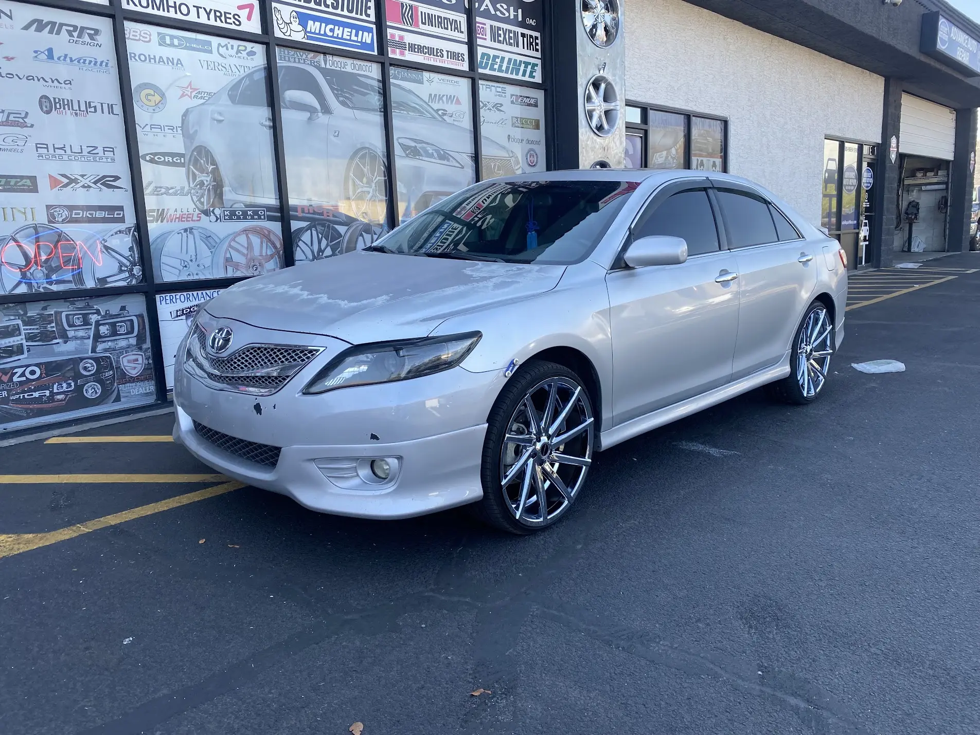 2011 Toyota Camry on 22x8.5 chrome Strada Wheels Sega with 235/30R22 tires at SHM Motorsports