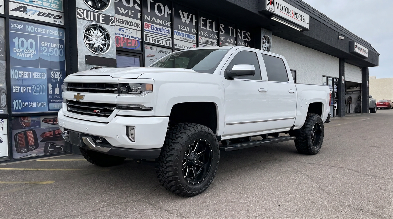 White 2021 Chevrolet Silverado with a 6-inch Rough Country lift kit, 24x10 wheels and Toyo Open Country tires