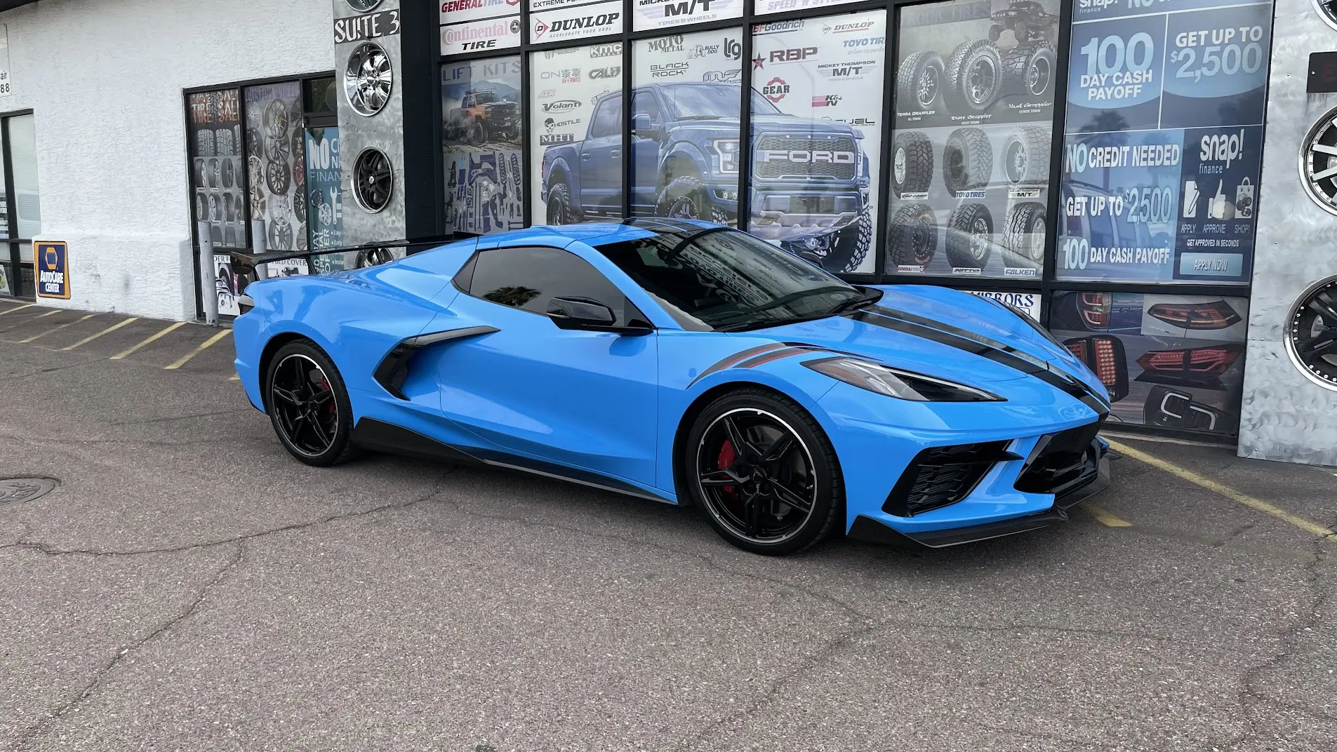Blue 2022 Chevrolet Corvette C8 Stingray front three-quarter view with window tint and front PPF at SHM Motorsports