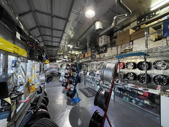 Inside the SHM Motorsports showroom with custom wheels and tires on display